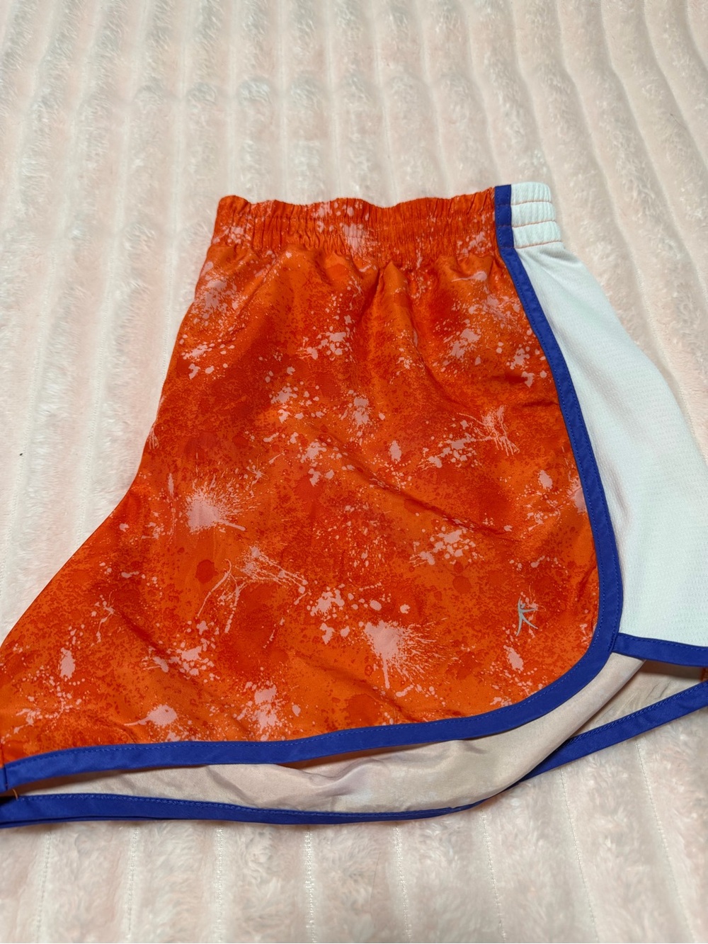 Danskin Orange Splatter Athletic Shorts with Blue Trim